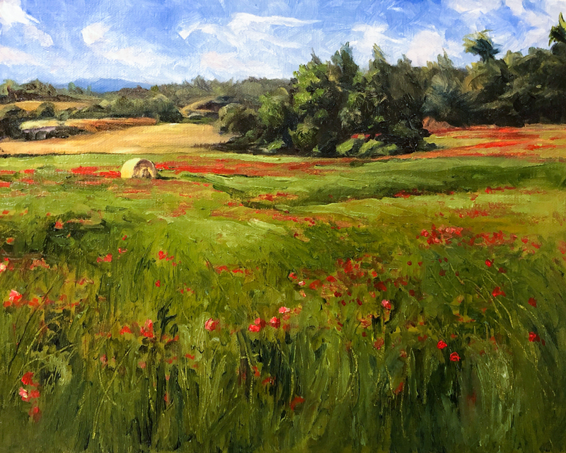 一幅红花田野的油画